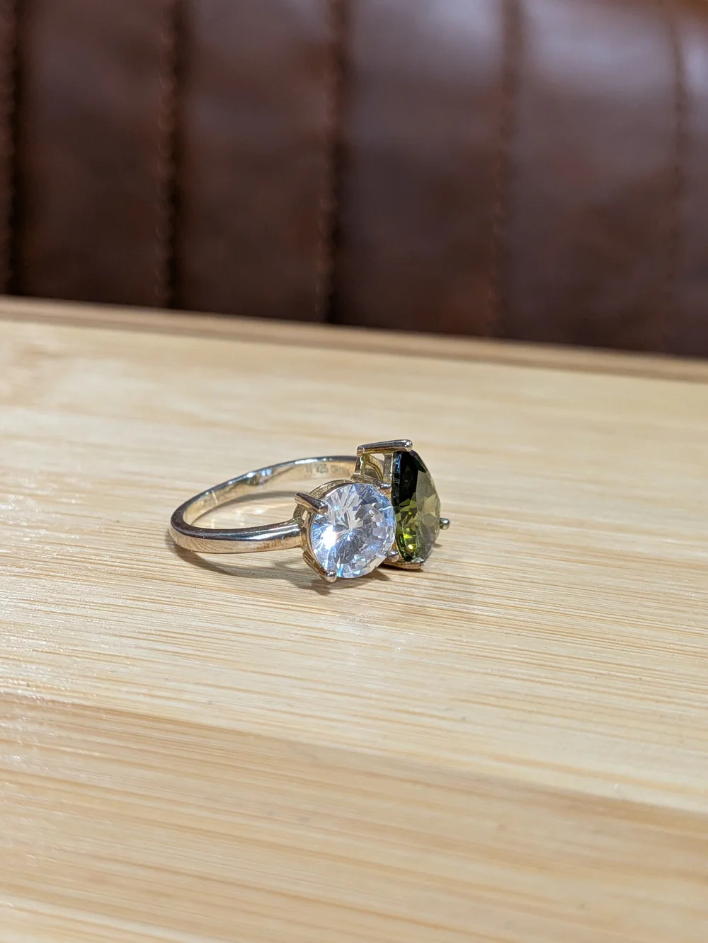 Double Stone Ring with Green Teardrop and Clear Round Gem